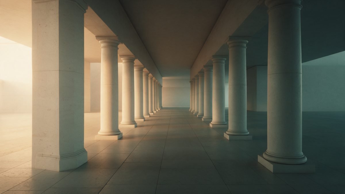 Deux colonnades de pierre claire se rejoignant en un point de fuite, lumière chaude d'un côté et ombre fraîche de l'autre